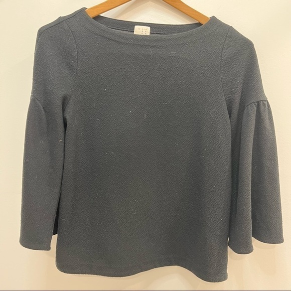 𝅺BLACK Flutter Sleeve Blouse - Picture 1 of 5